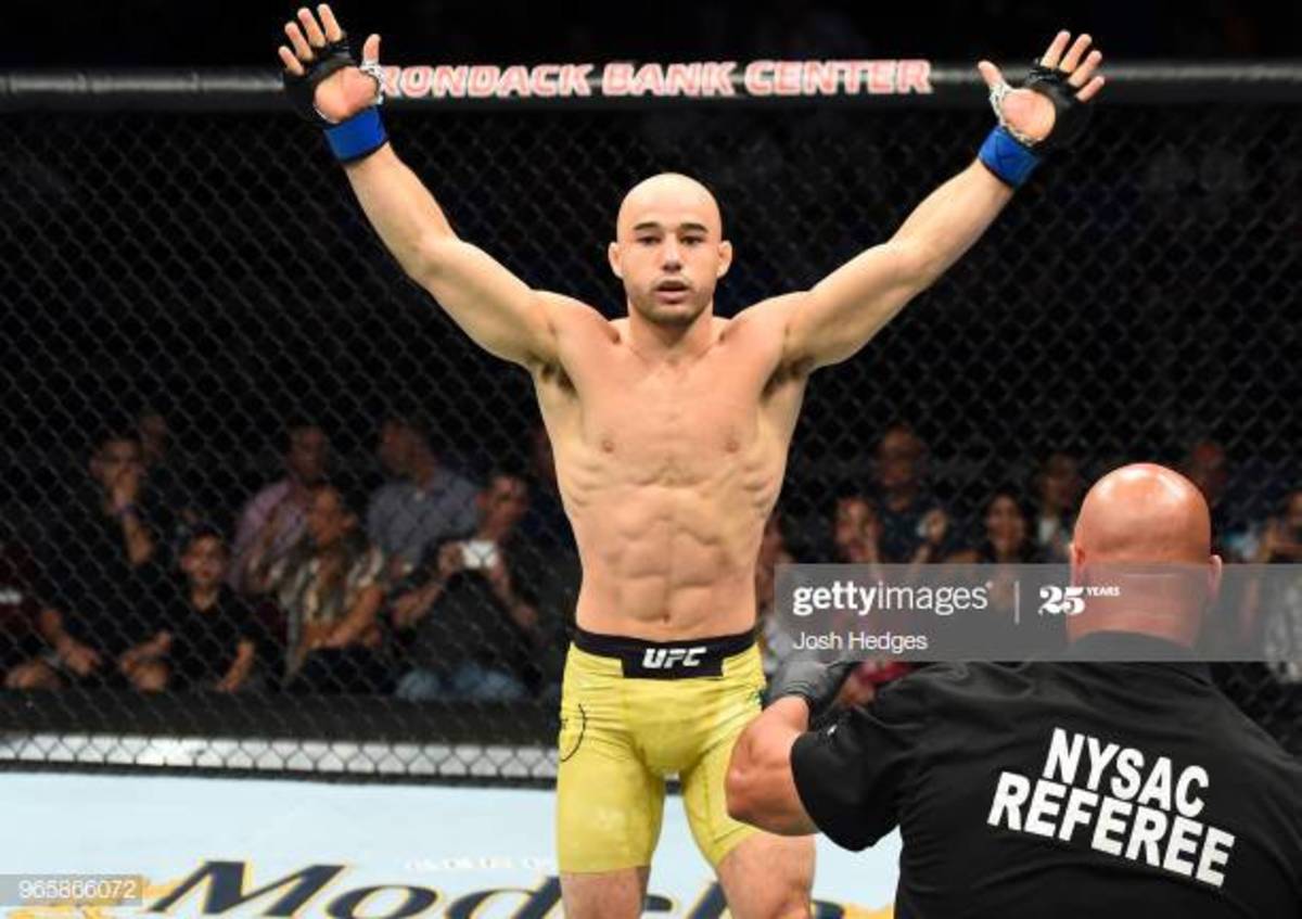 UTICA, NY - JUNE 01:  Marlon Moraes of Brazil celebrates after defeating Jimmie Rivera in their bantamweight fight during the UFC Fight Night event at the Adirondack Bank Center on June 1, 2018 in Utica, New York. (Photo by Josh Hedges/Zuffa LLC/Zuffa LLC via Getty Images)