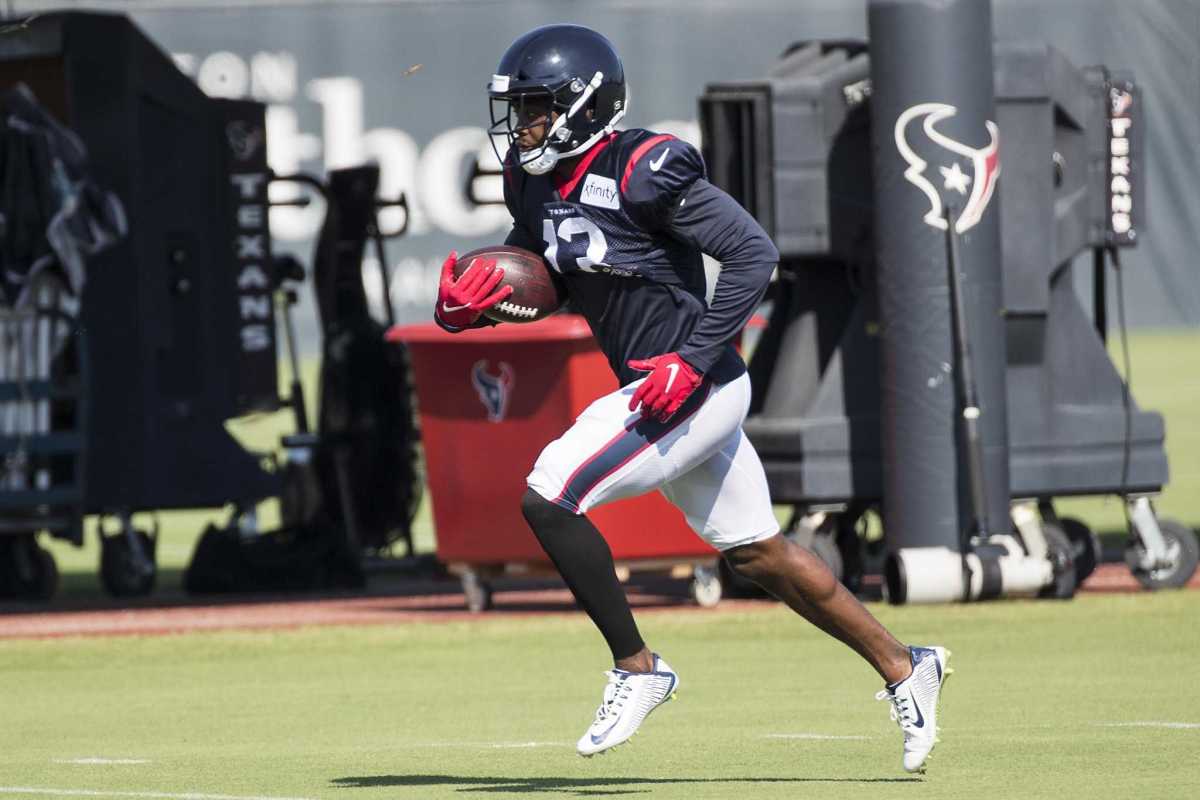 Houston Texans wide receiver Brandin Cooks (13) runs the ball upfield during an NFL training camp football practice Thursday, Aug. 20, 2020, in Houston.