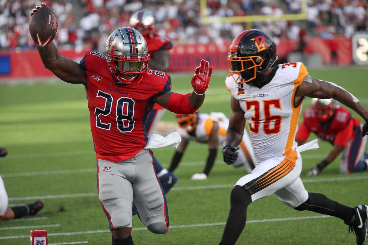 Houston Roughnecks running back James Butler (28) scores a touchdown during the second quarter of an XFL football game at TDECU Stadium on Saturday, Feb. 8, 2020, in Houston.