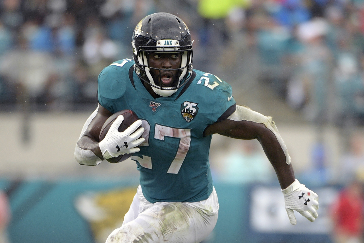 FILE - In this Oct. 27, 2019, file photo, Jacksonville Jaguars running back Leonard Fournette (27) rushes for yardage against the New York Jets during the first half of an NFL football game, in Jacksonville, Fla. Fournette used to be considered a building block in Jacksonville. Then he ended up on the trading block. Now, the bruising running back is entering the final year of his rookie contract and facing an uncertain future with the franchise. (AP Photo/Phelan M. Ebenhack, File)