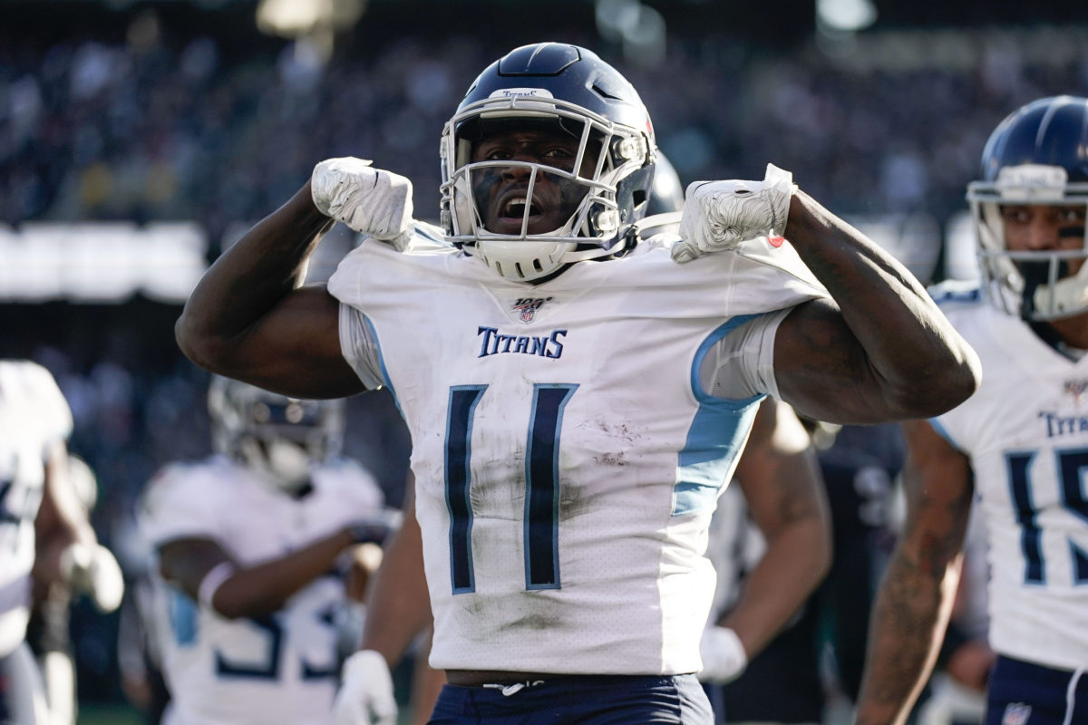 Dec 8, 2019; Oakland, CA, USA; Tennessee Titans wide receiver A.J. Brown (11) celebrates after scoring a touchdown against the Oakland Raiders during the second quarter at Oakland Coliseum. Mandatory Credit: Stan Szeto-USA TODAY Sports