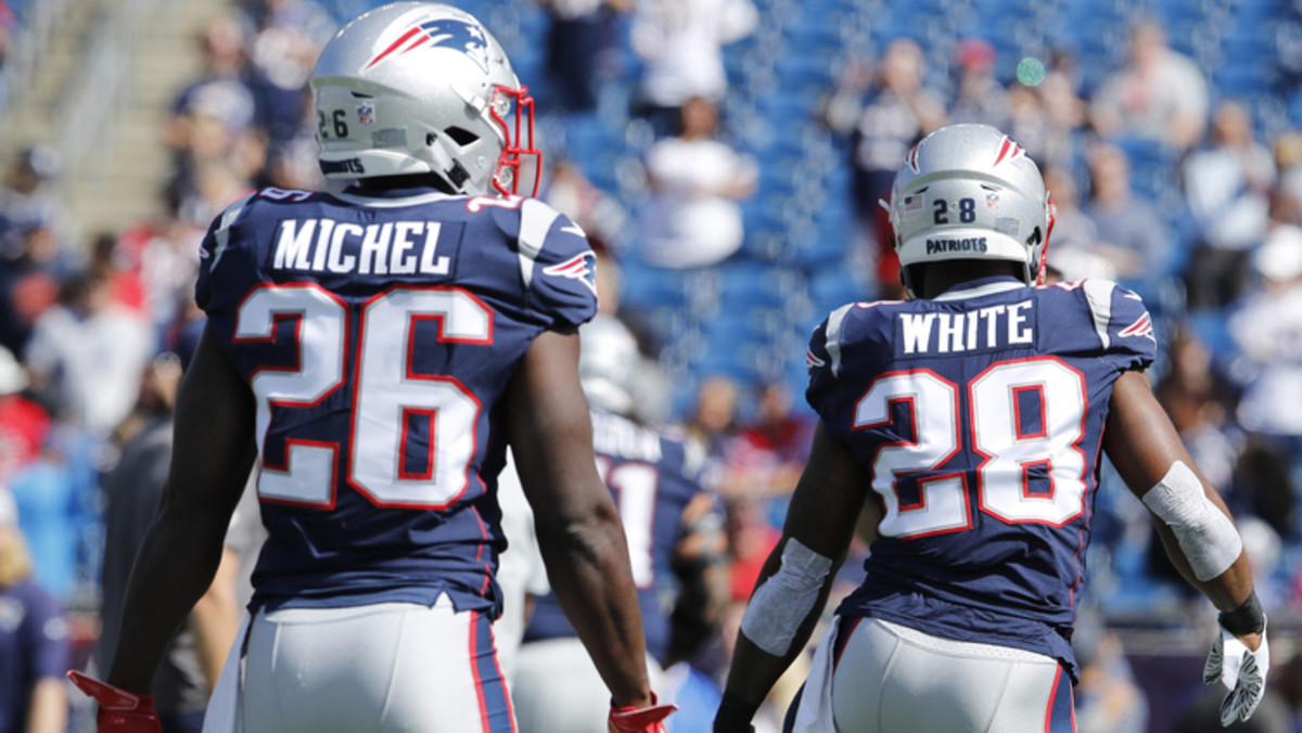 Sep 30, 2018; Foxborough, MA, USA; New England Patriots running back Sony Michel (26) and running back James White (28) warm up before the start of the game against the Miami Dolphins at Gillette Stadium. Mandatory Credit: David Butler II-USA TODAY Sports