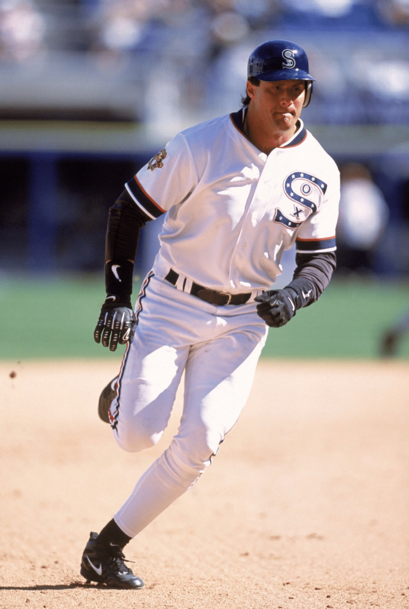 Jose Canseco wearing the White Sox 1917 throwback jerseys during a game in 2001