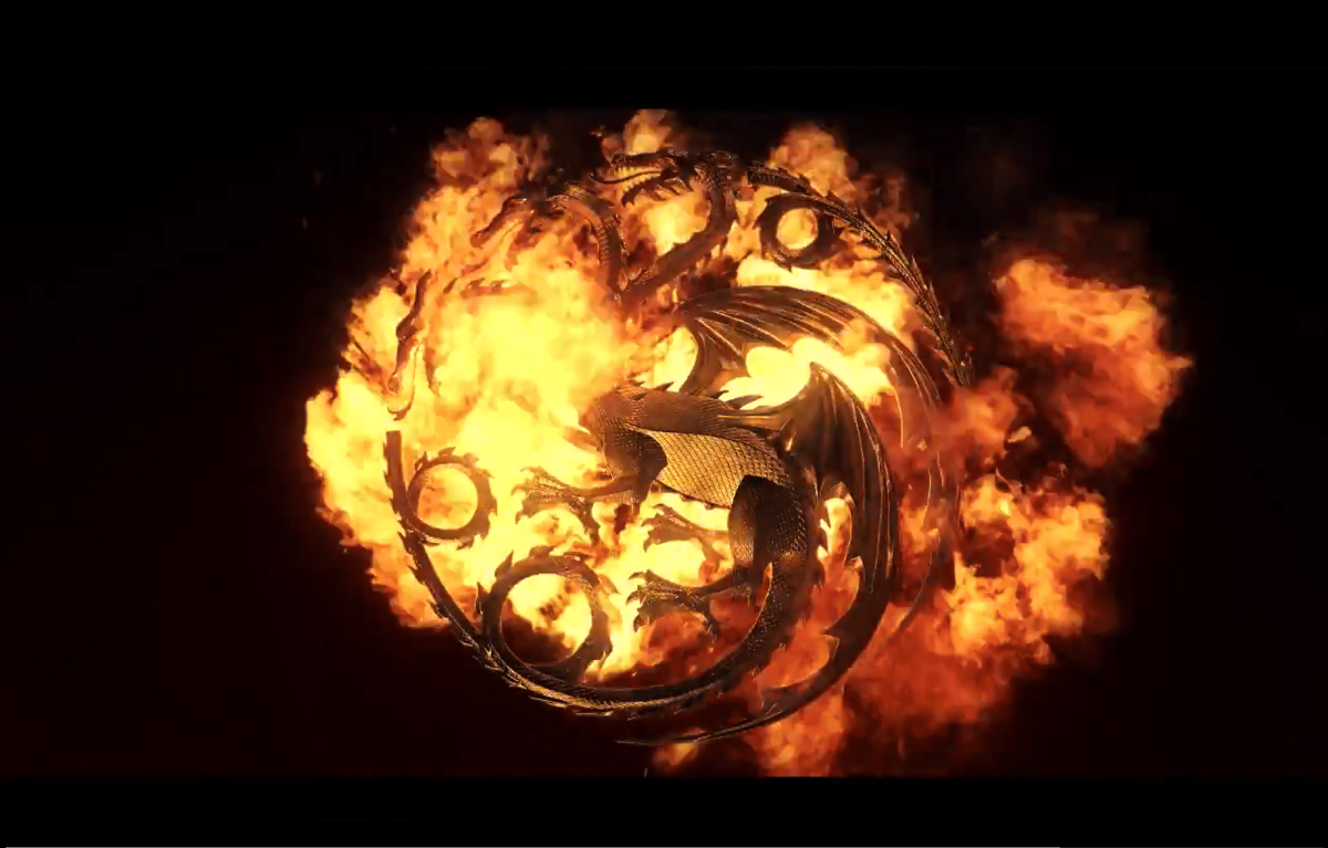 A picture of the three-headed dragon symbol of House Targaryen from Game of Thrones and House of the dragon. The symbol is engulfed with flames and beneath the image is a quote from the teaser trailer "Dreams didn't make us kings. Dragons did."