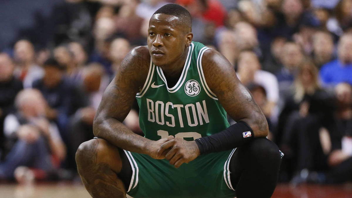 Feb 26, 2019; Toronto, Ontario, CAN; Boston Celtics guard Terry Rozier (12) reacts during a break in the action against the Toronto Raptors at Scotiabank Arena. Toronto defeated Boston. Mandatory Credit: John E. Sokolowski-USA TODAY Sports