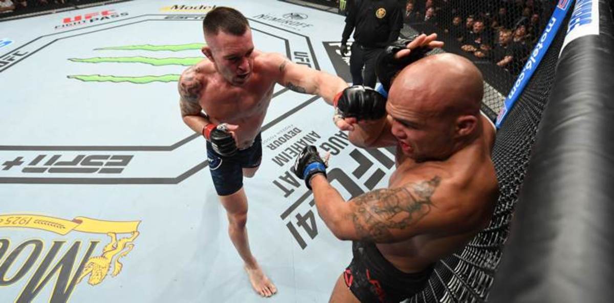 Colby-Covington-punches-Robbie-Lawler-at-UFC-on-ESPN-5