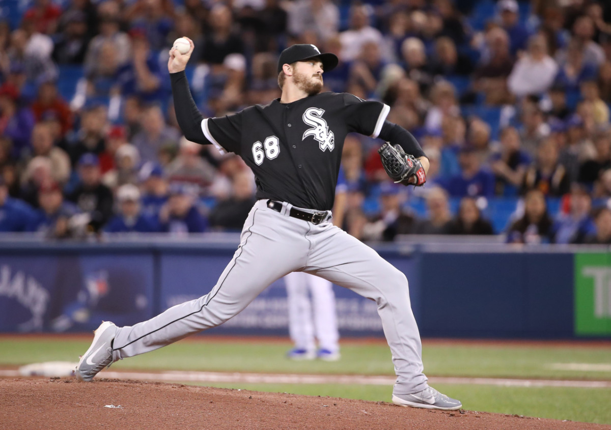 TORONTO, ON - MAY 10: Dylan Covey #68 of the Chicago White Sox delivers a pitch in the first inning during MLB game action against the Toronto Blue Jays at Rogers Centre on May 10, 2019 in Toronto, Canada. (Photo by Tom Szczerbowski/Getty Images) ORG XMIT: 775309043