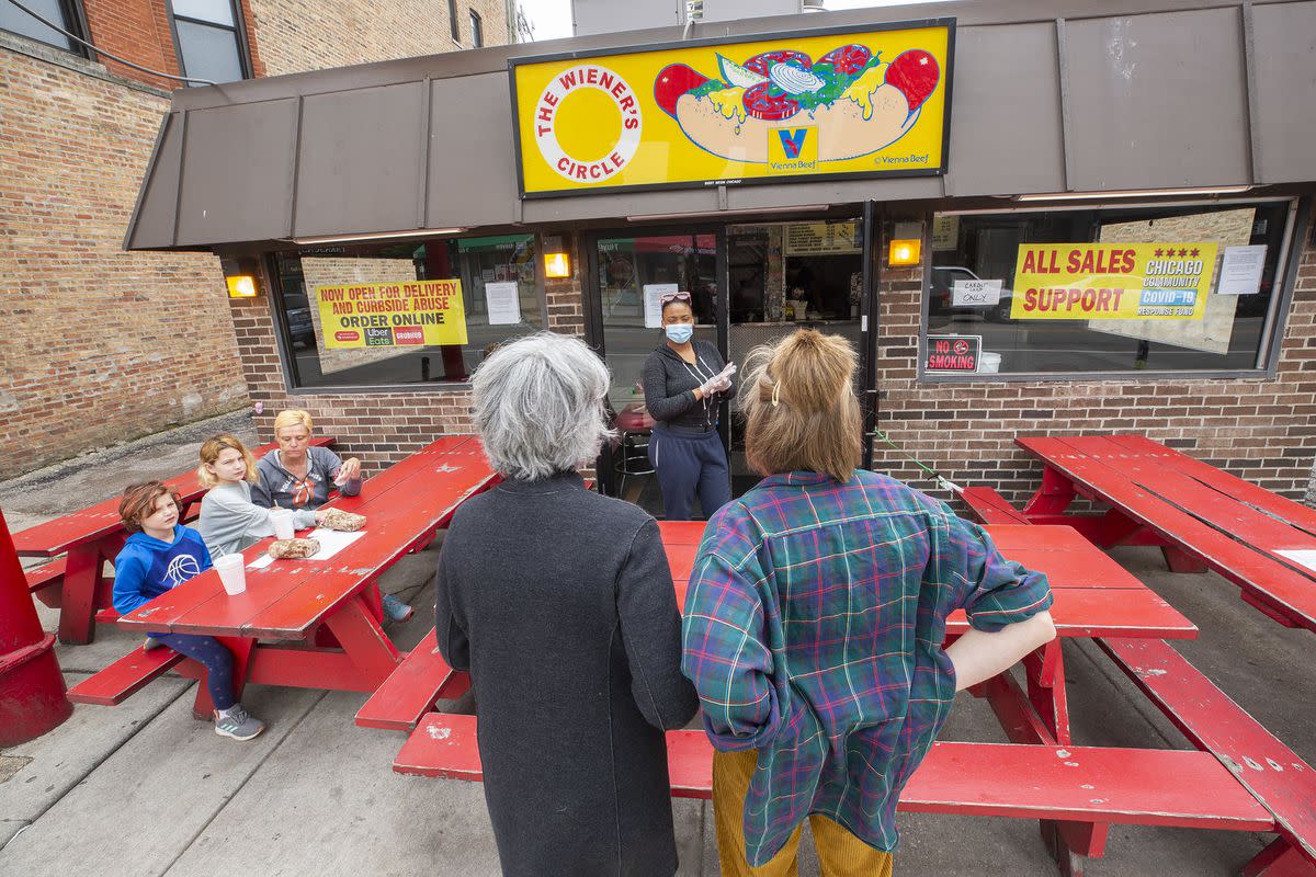 During the COVID-19 pandemic, Weiner's Circle was still roasting customers, except in a socially distancing manner.Photo: Barry Brecheisen/Eater Chicago