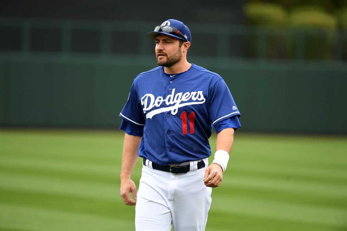 GLENDALE, ARIZONA - MARCH 11: AJ Pollock #11 of the Los Angeles Dodgers walks to the dugout prior to a spring training game against the San Francisco Giants at Camelback Ranch on March 11, 2019 in Glendale, Arizona. (Photo by Norm Hall/Getty Images)