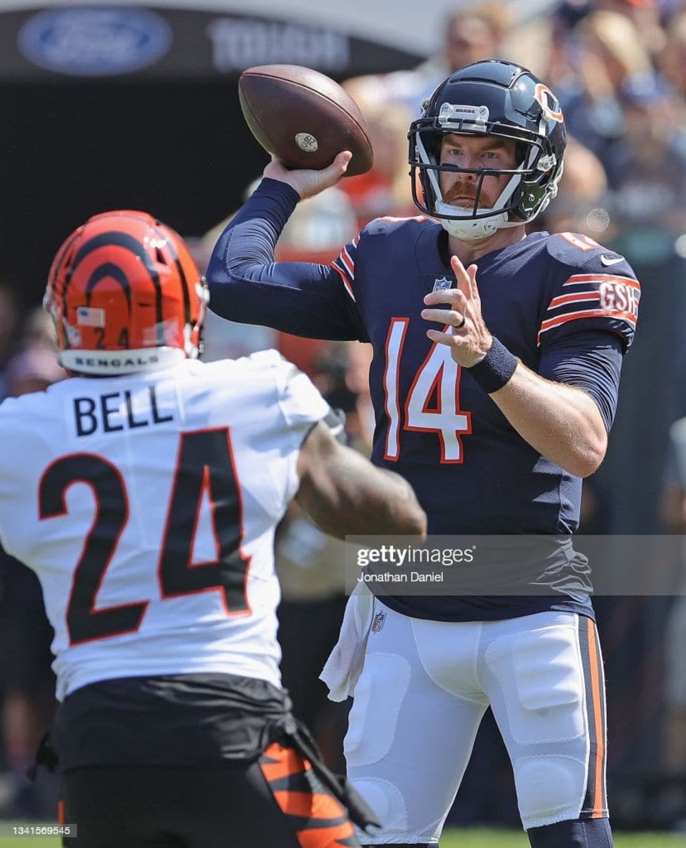 CHICAGO, ILLINOIS - SEPTEMBER 19: Andy Dalton #14 of the Chicago Bears passes under pressure from Vonn Bell #24 of the Cincinnati Bengals at Soldier Field on September 19, 2021 in Chicago, Illinois. The Bears defeated the Bengals 20-17. (Photo by Jonathan Daniel/Getty Images)