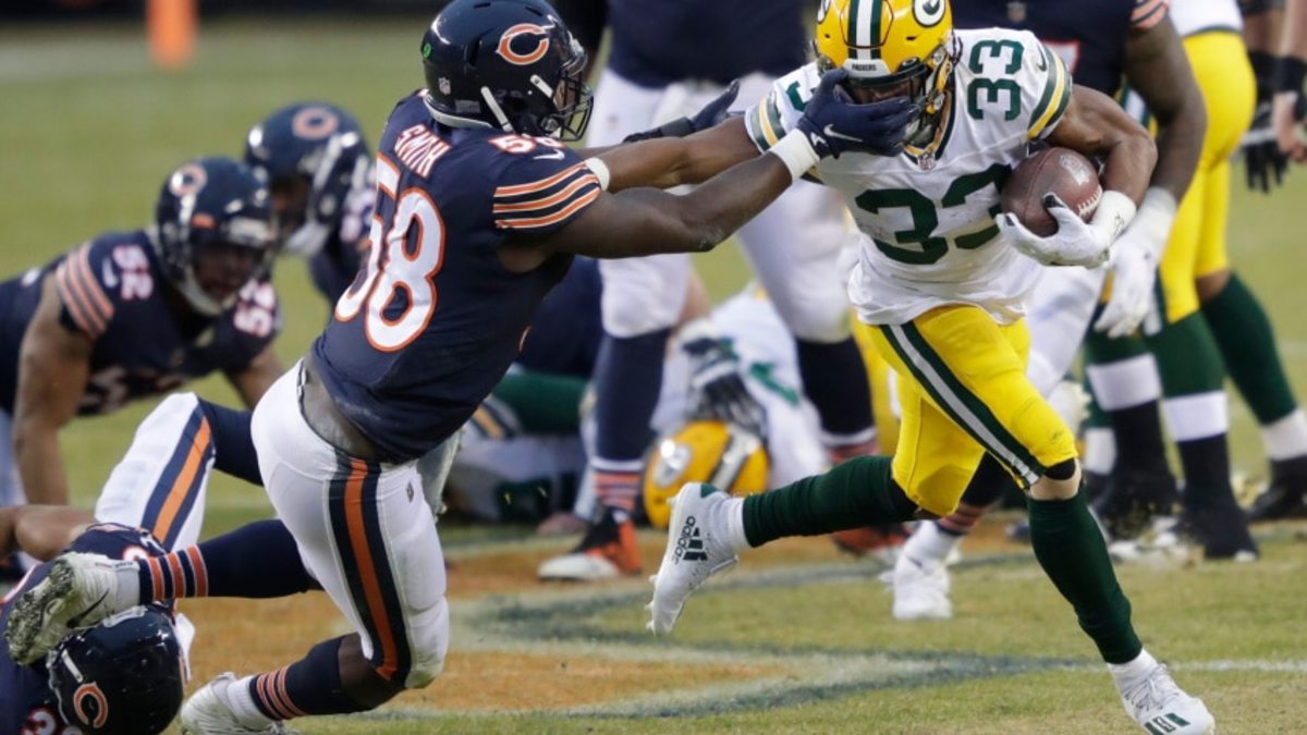 Green Bay Packers running back Aaron Jones (33) runs for a gain against Chicago Bears inside linebacker Roquan Smith (58) during their football game Sunday, January 3, 2021, at Soldier Field in Chicago, Ill. Dan Powers/USA TODAY NETWORK-Wisconsin Cent02 7dwzvd3u7ds362zohj8 Original