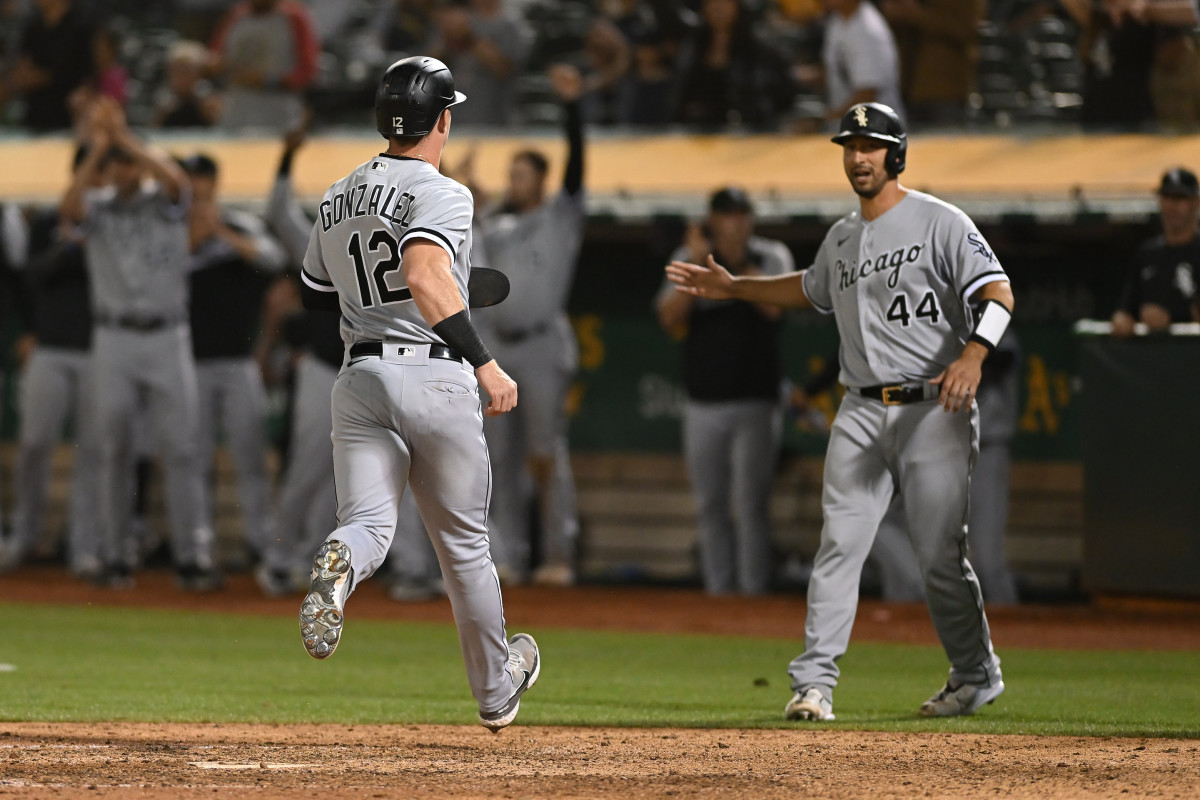 Sep 9, 2022; Oakland, California, USA; Chicago White Sox second baseman Romy Gonzalez (12) scores a run against the Oakland Athletics during the ninth inning at RingCentral Coliseum.