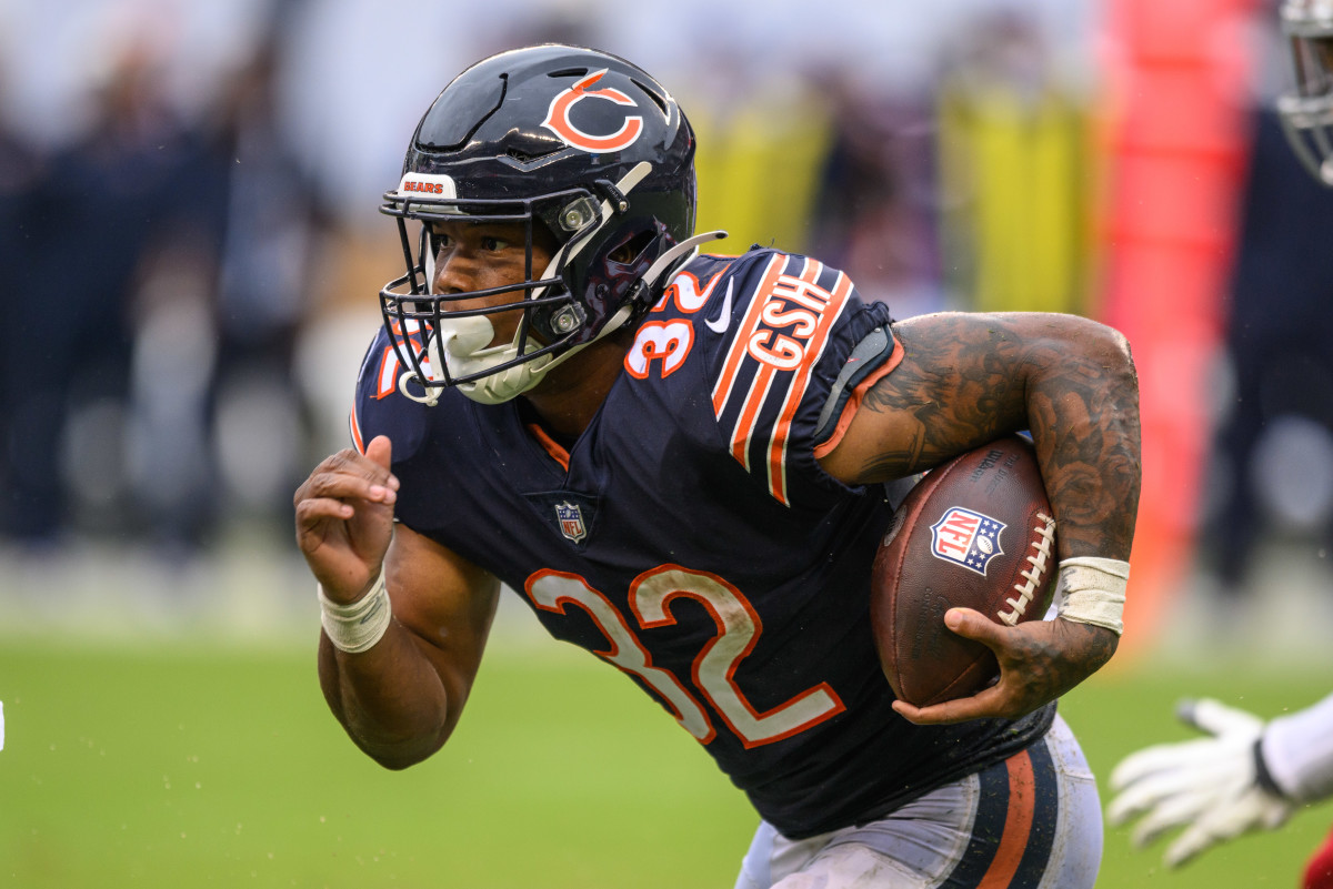 Sep 11, 2022; Chicago, Illinois, USA; Chicago Bears running back David Montgomery (32) runs the ball in the second quarter against the San Francisco 49ers at Soldier Field.