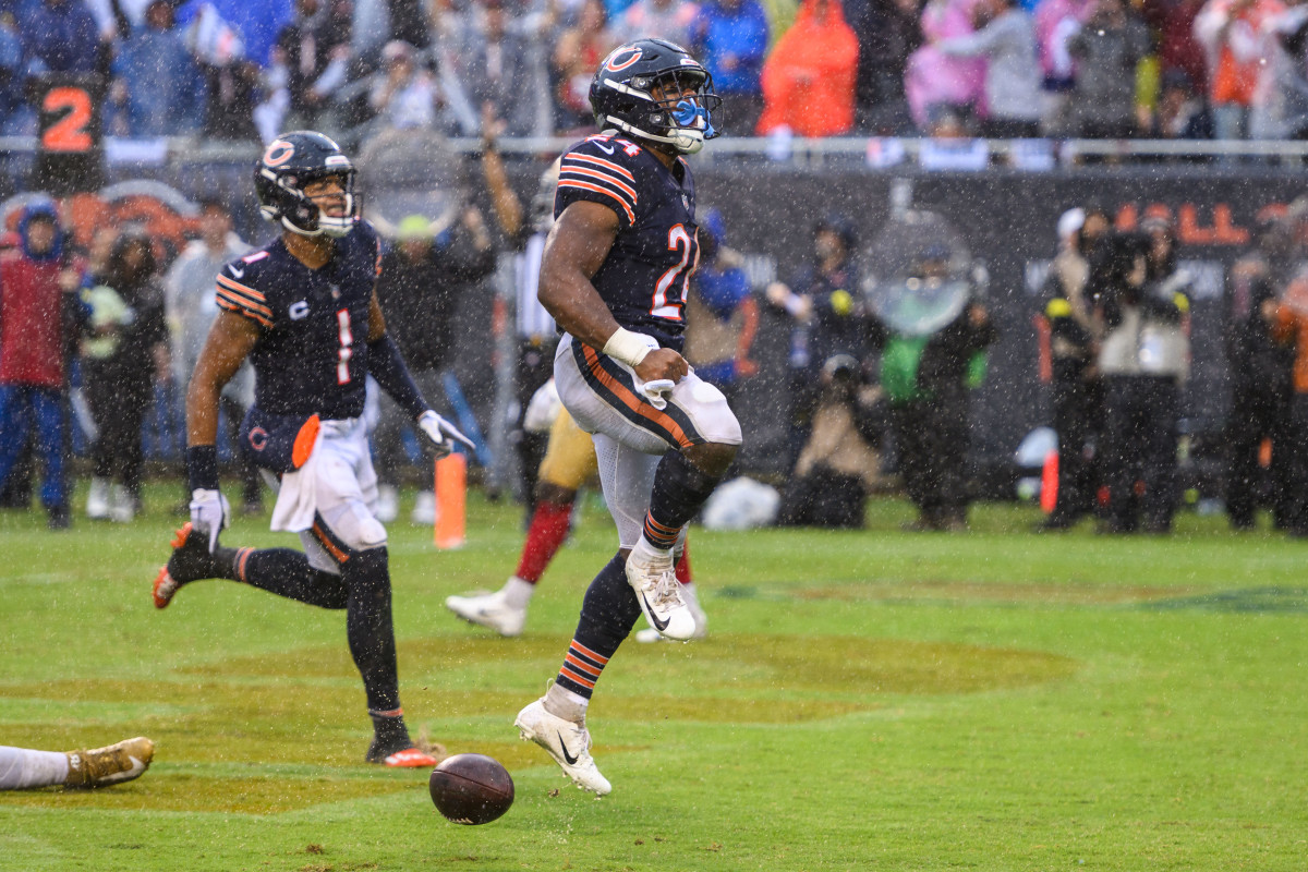 Sep 11, 2022; Chicago, Illinois, USA; Chicago Bears running back Khalil Herbert (24) celebrates his touchdown run in the fourth quarter against the San Francisco 49ers at Soldier Field.