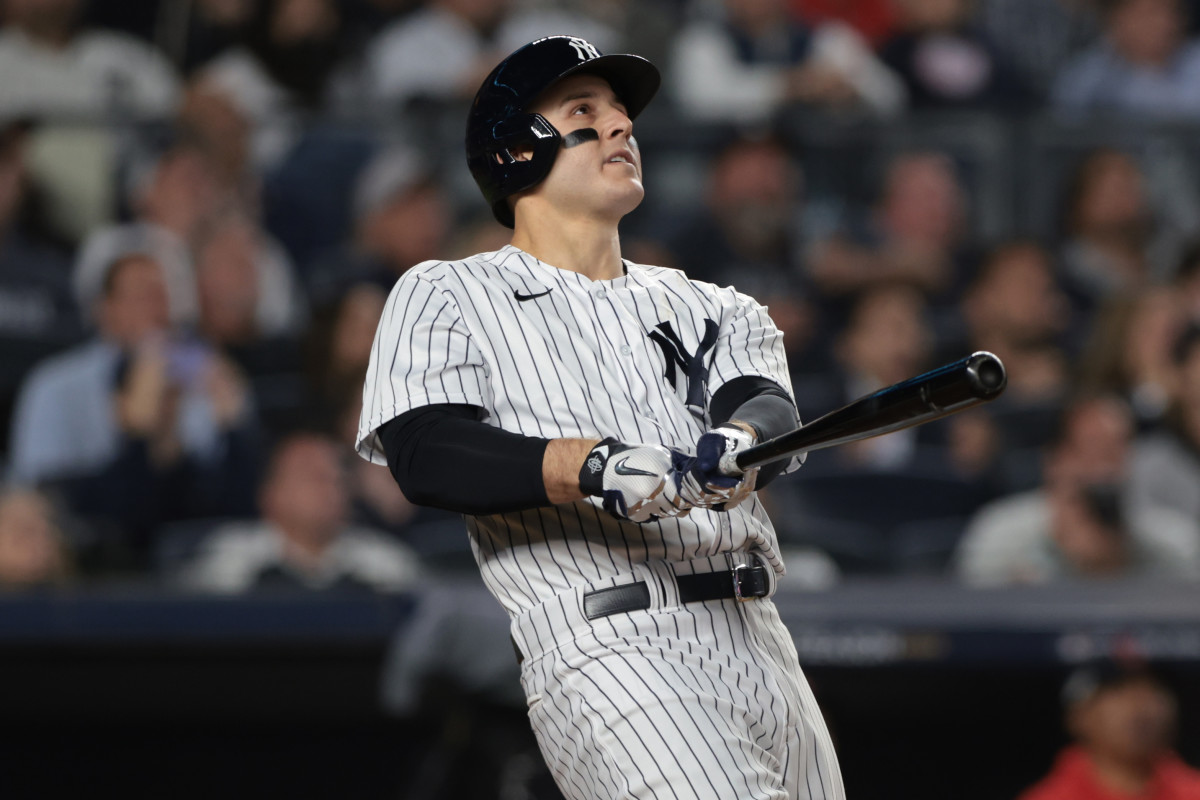 Oct 11, 2022; Bronx, New York, USA; New York Yankees first baseman Anthony Rizzo (48) hits a home run during the sixth inning against the Cleveland Guardians in game one of the ALDS for the 2022 MLB Playoffs at Yankee Stadium.