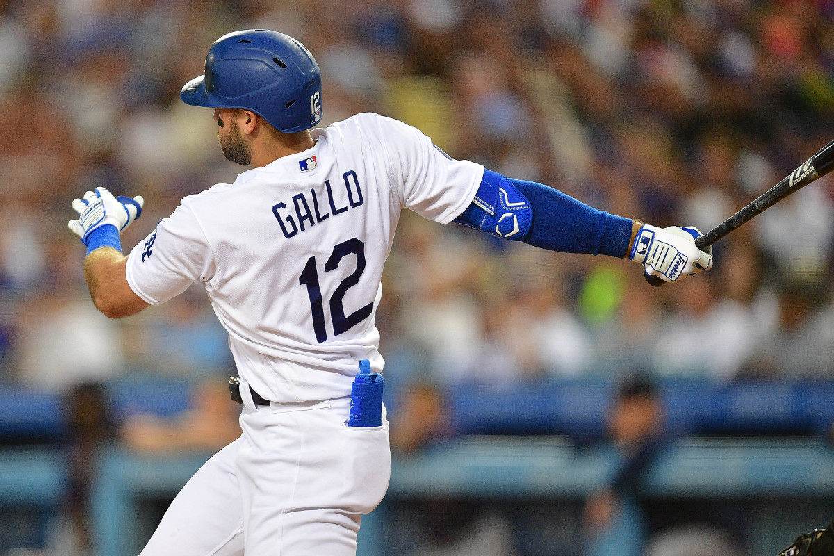 Aug 9, 2022; Los Angeles, California, USA; Los Angeles Dodgers left fielder Joey Gallo (12) hits a double against the Minnesota Twins during the second inning at Dodger Stadium.