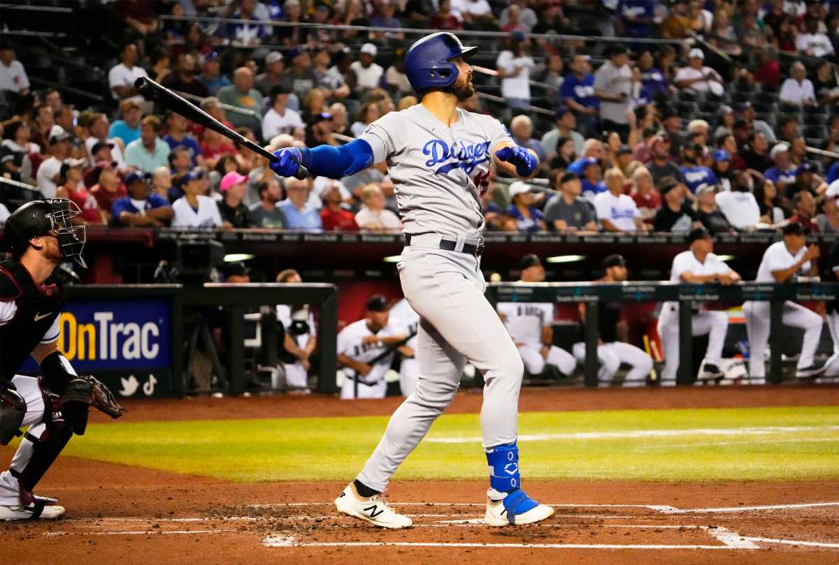 Sep 13, 2022; Phoenix, Arizona, USA; Los Angeles Dodgers Joey Gallo (12) hits a two-run home run against the Arizona Diamondbacks in the second inning at Chase Field.
