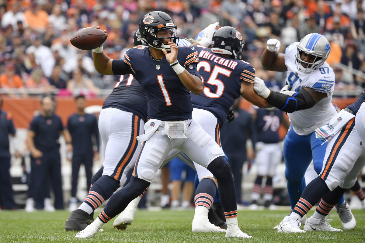 Oct 3, 2021; Chicago, Illinois, USA; Chicago Bears quarterback Justin Fields (1) passes the football in the first half against the Detroit Lions at Soldier Field.