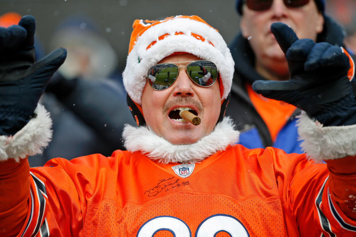 Jan 2, 2022; Chicago, Illinois, USA; A Chicago Bears fan poses for a photo during warmups before the game against the New York Giants at Soldier Field.