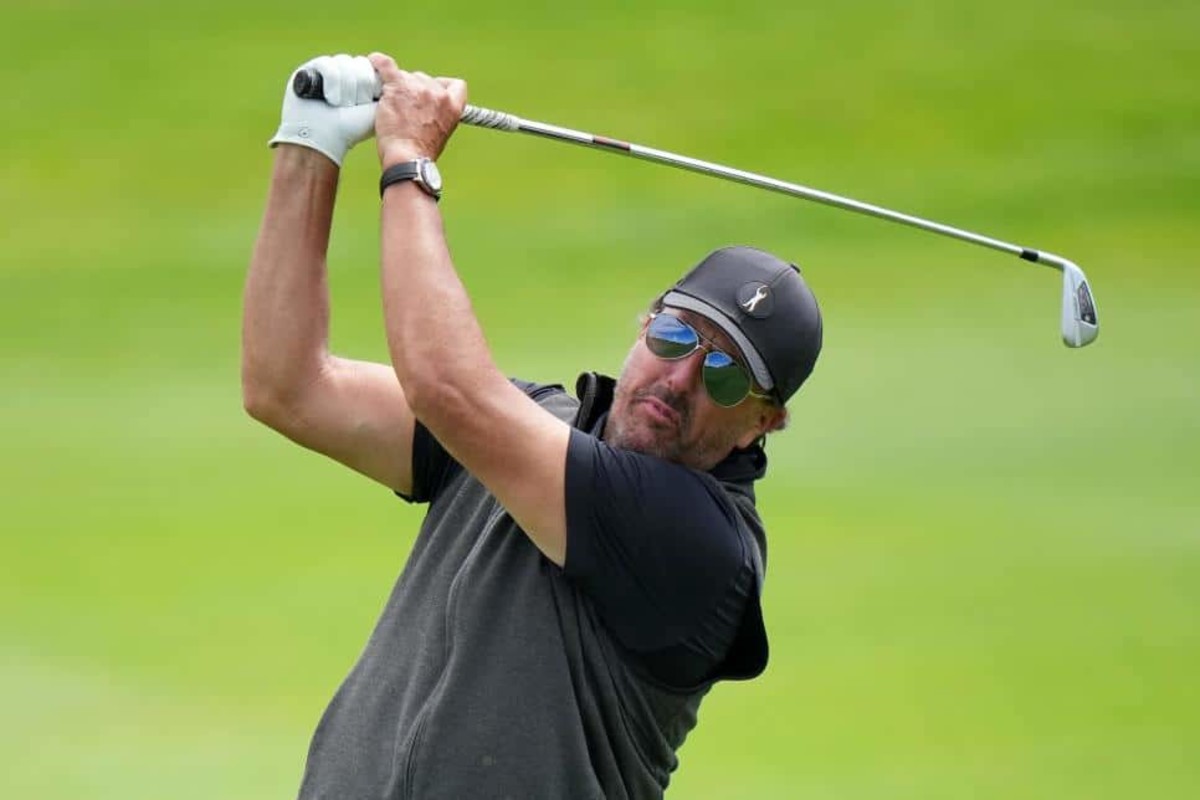 A picture of golfer Phil Mickelson playing in round one of the inaugural LIV Golf Invitational Series event in London, UK.